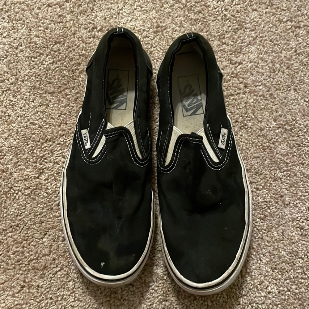 Black slip on vans women’s 9 and men’s 7.5